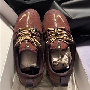 Nike Women’s Burgundy Sneakers with Gold Accents